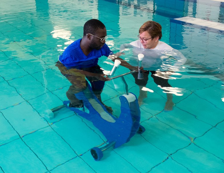 Underwater bicycle with patient and therapist